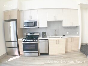 1037 S Hobart Blvd in Los Angeles, CA - Building Photo - Building Photo