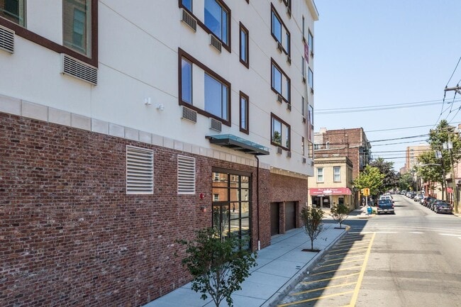 property at 6122 Hudson Ave