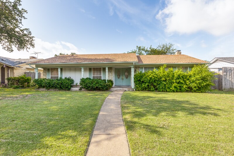 1312 E Spring Valley Rd in Richardson, TX - Building Photo