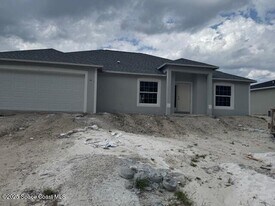 417 Harrington St SW in Palm Bay, FL - Building Photo