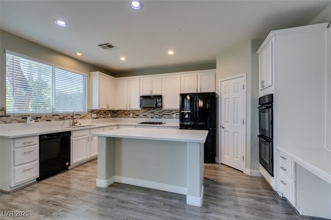 property at 9029 Blue Raven Ave