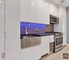 STANTON ST., Unit 5F in New York, NY - Building Photo