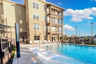 The Flats at Hooper Hill in Conroe, TX - Building Photo - Building Photo