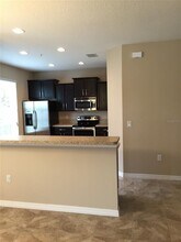 10229 Lake District Ln in Orlando, FL - Building Photo - Building Photo