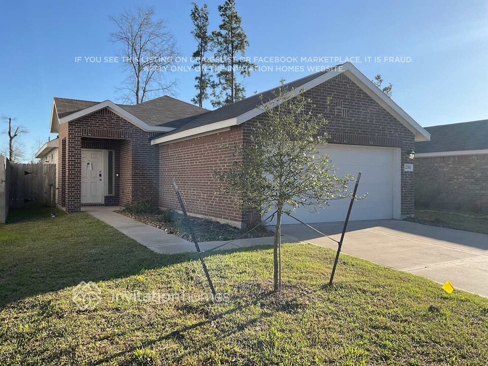 22384 Sonora River Trce, Unit 5601-105 in Roman Forest, TX - Building Photo