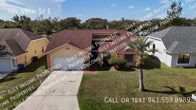 property at 704 49th St E