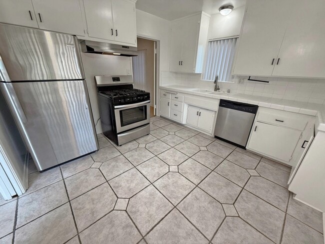 833 S Plymouth Blvd, Unit 839-1 in Los Angeles, CA - Foto de edificio - Building Photo