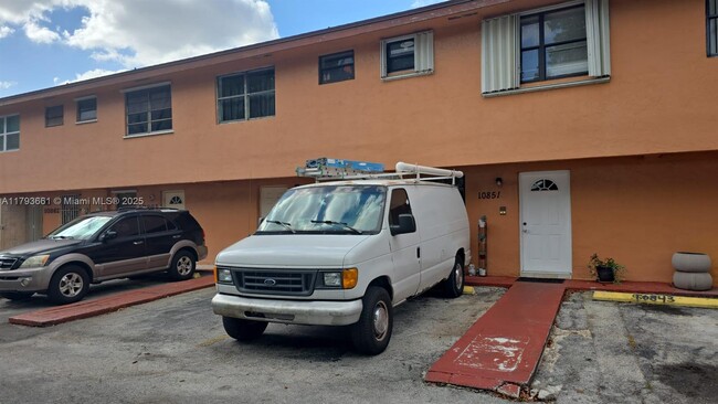 property at 10851 SW 6th St