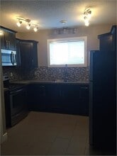 7414-7114 StreetUnit AKey 73 in Grande Prairie, AB - Building Photo - Building Photo