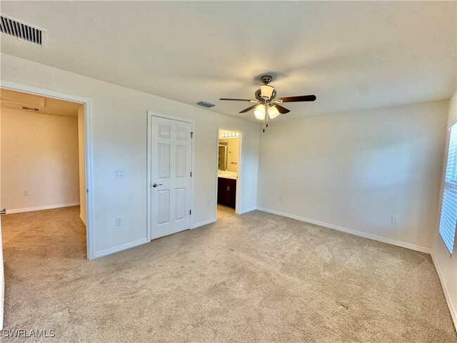 15257 Wildflower Cir in Naples, FL - Building Photo - Building Photo