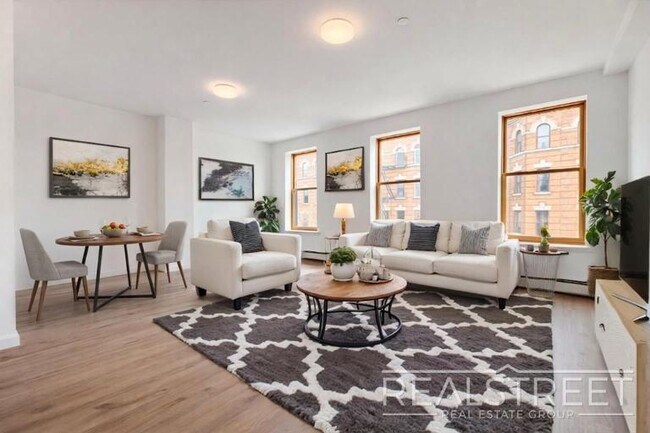 Full-Floor Renovated 2BR | Expansive Living Space | 1 Min to A Train, Unit 3 in Brooklyn, NY - Building Photo - Building Photo