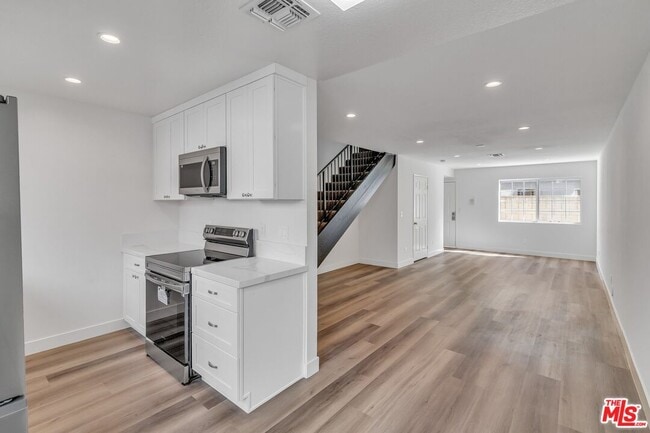 property at 6616 Sylmar Ave