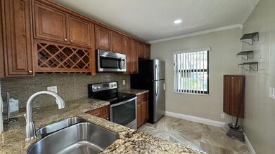 3819 Carambola Cir N-Unit -2941 in Coconut Creek, FL - Building Photo - Building Photo