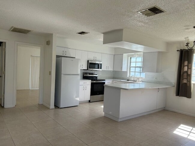 6642 Timbercove Ln in New Port Richey, FL - Building Photo - Building Photo