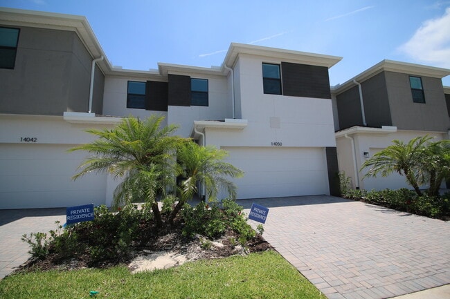 property at 14050 SW Thorens Dr