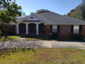 2061 Riviera Ln S in Navarre, FL - Building Photo