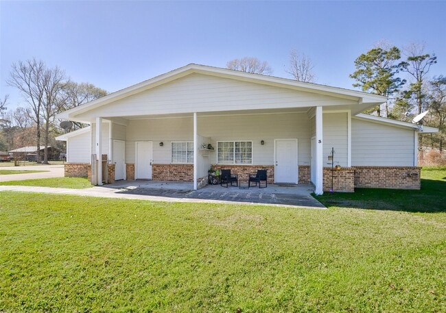 3 Magnolia Ln, Unit 1 in Huffman, TX - Foto de edificio - Building Photo