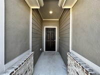 7703 Ivy Trellis Trl in Del Valle, TX - Foto de edificio - Building Photo