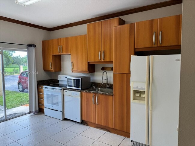 property at 6922 NW 179th St