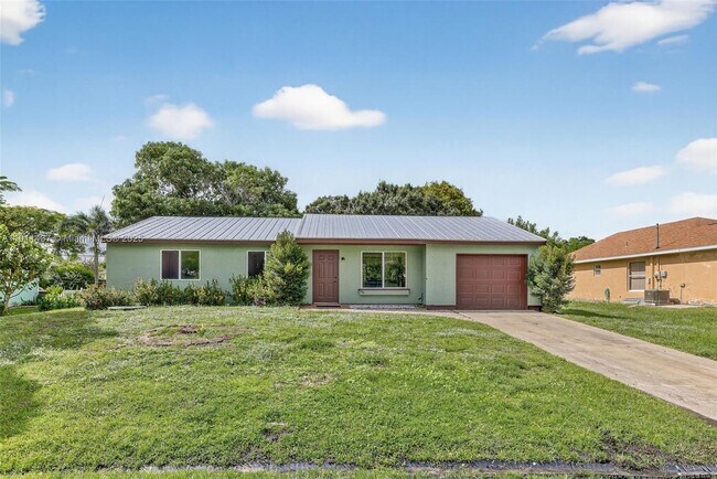 property at 2252 SE Aneci St