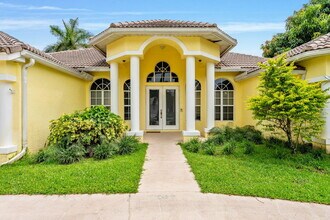 103 Black Olive Crescent in Royal Palm Beach, FL - Building Photo - Building Photo