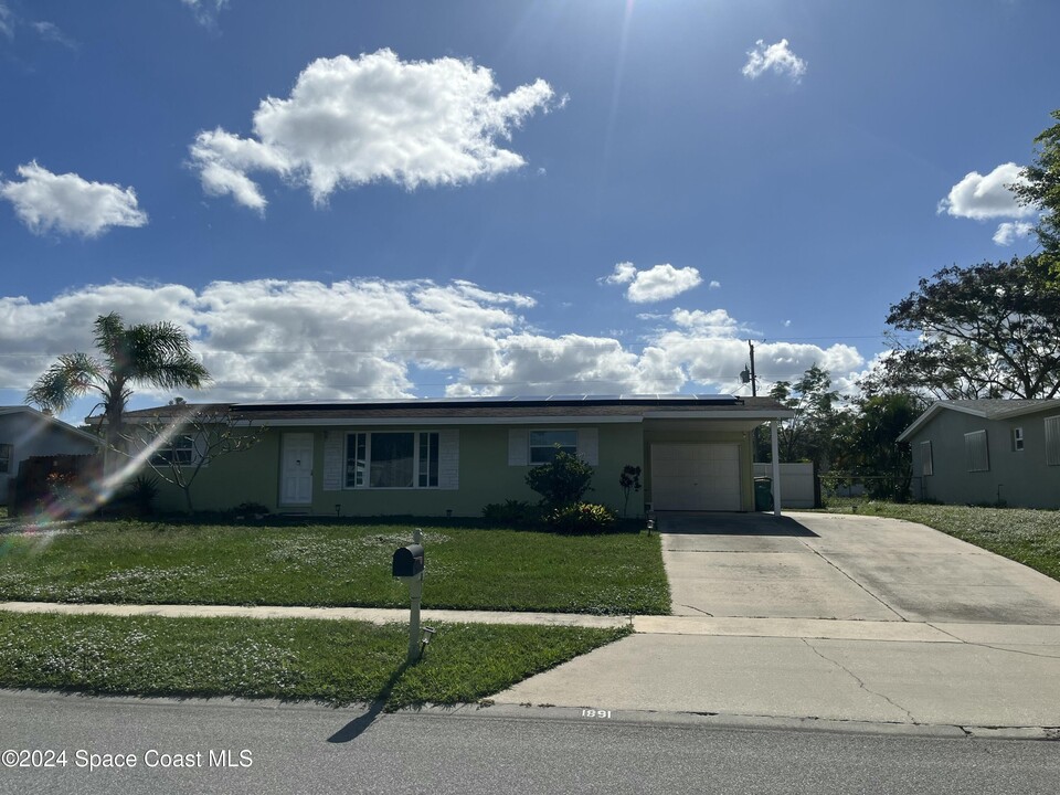 1891 Ixora Dr W in Melbourne, FL - Building Photo