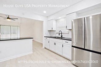 12006 Smalley Ave in Grandview, MO - Building Photo - Building Photo