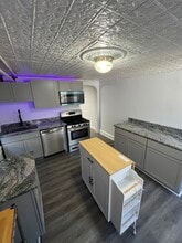 118 S Washington St, Unit 1 in Baltimore, MD - Foto de edificio - Building Photo