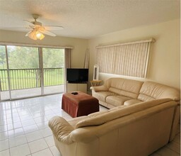 12650 SW 15th St-Unit -214F in Pembroke Pines, FL - Building Photo - Building Photo