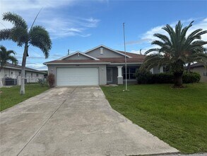 4025 SW 14th Pl in Cape Coral, FL - Building Photo - Building Photo