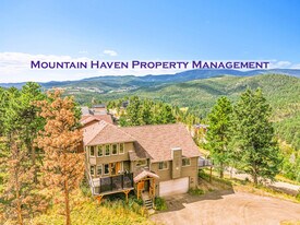 7052 Lynx Lair Rd in Evergreen, CO - Building Photo