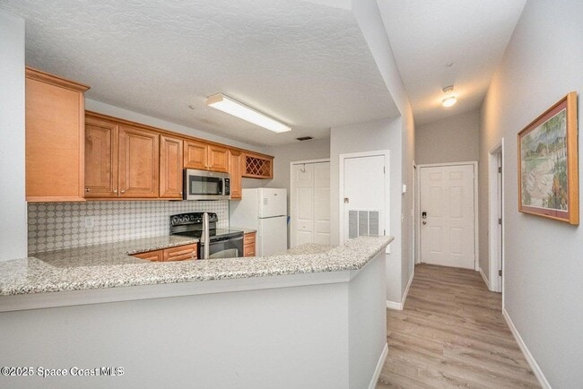 7667 N Wickham Rd, Unit 1419 in Melbourne, FL - Building Photo - Building Photo