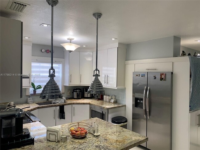property at 3241 NW 17th St