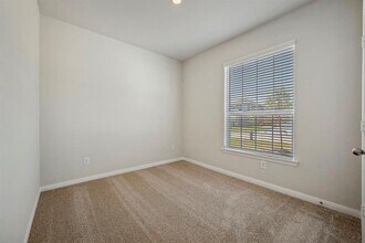 10419 Red Cardinal Dr in Cleveland, TX - Building Photo - Building Photo