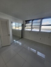 1175 NE Miami Gardens Dr, Unit 703 in North Miami Beach, FL - Building Photo - Building Photo