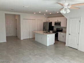 14309 Oviedo Pl in Tice, FL - Building Photo - Building Photo