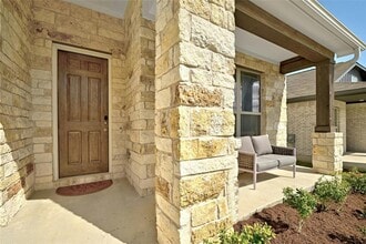 303 Cherrystone Loop in Mustang Ridge, TX - Building Photo - Building Photo