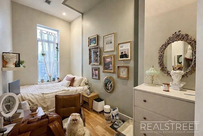 Spacious 3-Bedroom Residence Near Maria Hernandez Park, Unit 2L in Brooklyn, NY - Building Photo - Building Photo