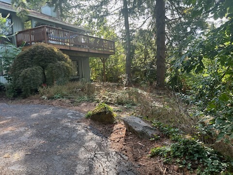 property at 9725 NW Leahy Rd