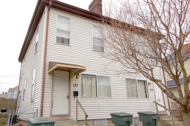 135-137-137 E 4th Ave