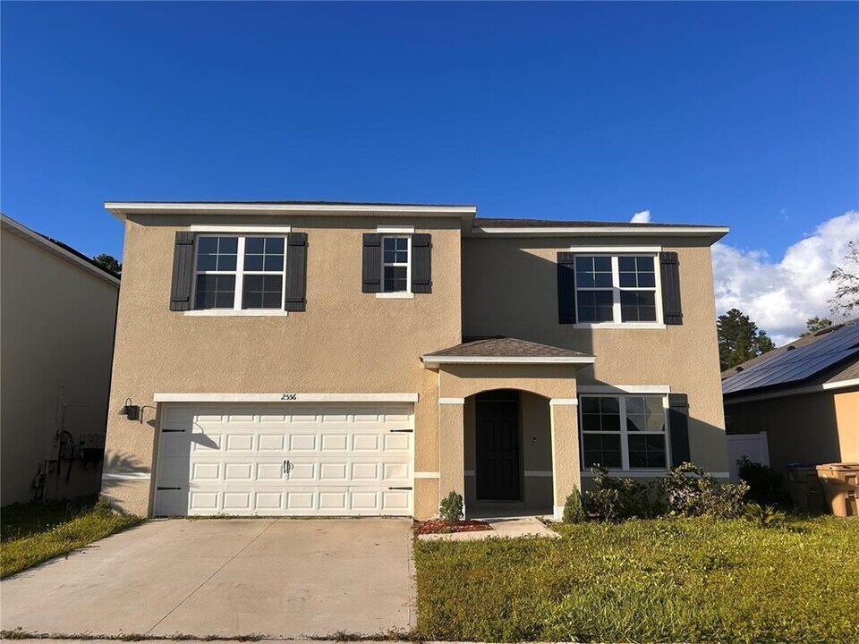 2556 Harmonia Hammock Rd in Harmony, FL - Building Photo