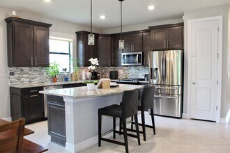 620 SE Monet Dr in Port St. Lucie, FL - Building Photo - Building Photo