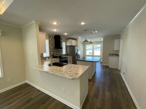 13145 Grape Ave in Grand Island, FL - Foto de edificio - Building Photo