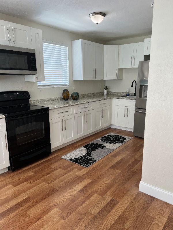 46 NW 1st St