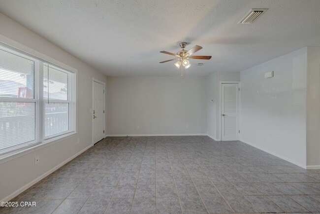 7813 N Lagoon Dr in Panama City Beach, FL - Building Photo - Building Photo