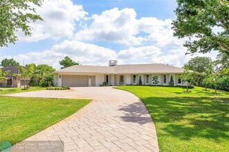 6148 NW 74th Terrace in Parkland, FL - Building Photo - Building Photo