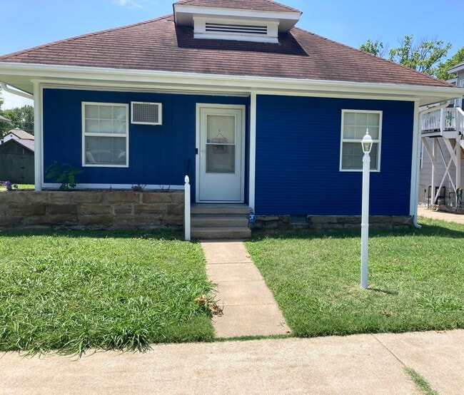 property at 211 E Will Rogers Blvd