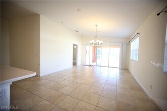 7558 Rozzini Ln in Naples, FL - Building Photo - Building Photo