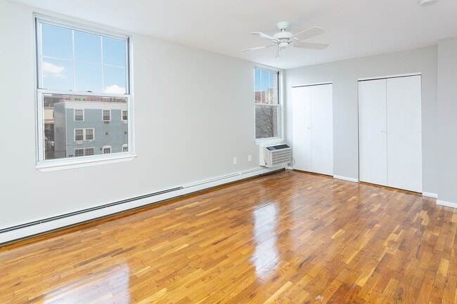 King sided bedroom with tons of closets available in Bronx, NY - Building Photo - Building Photo