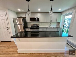 2BR 1BA Classic Details Top Floor Brownstone w/ New Modern Finish on Preserved Bedstuy Block, Unit 3 in Brooklyn, NY - Building Photo - Building Photo